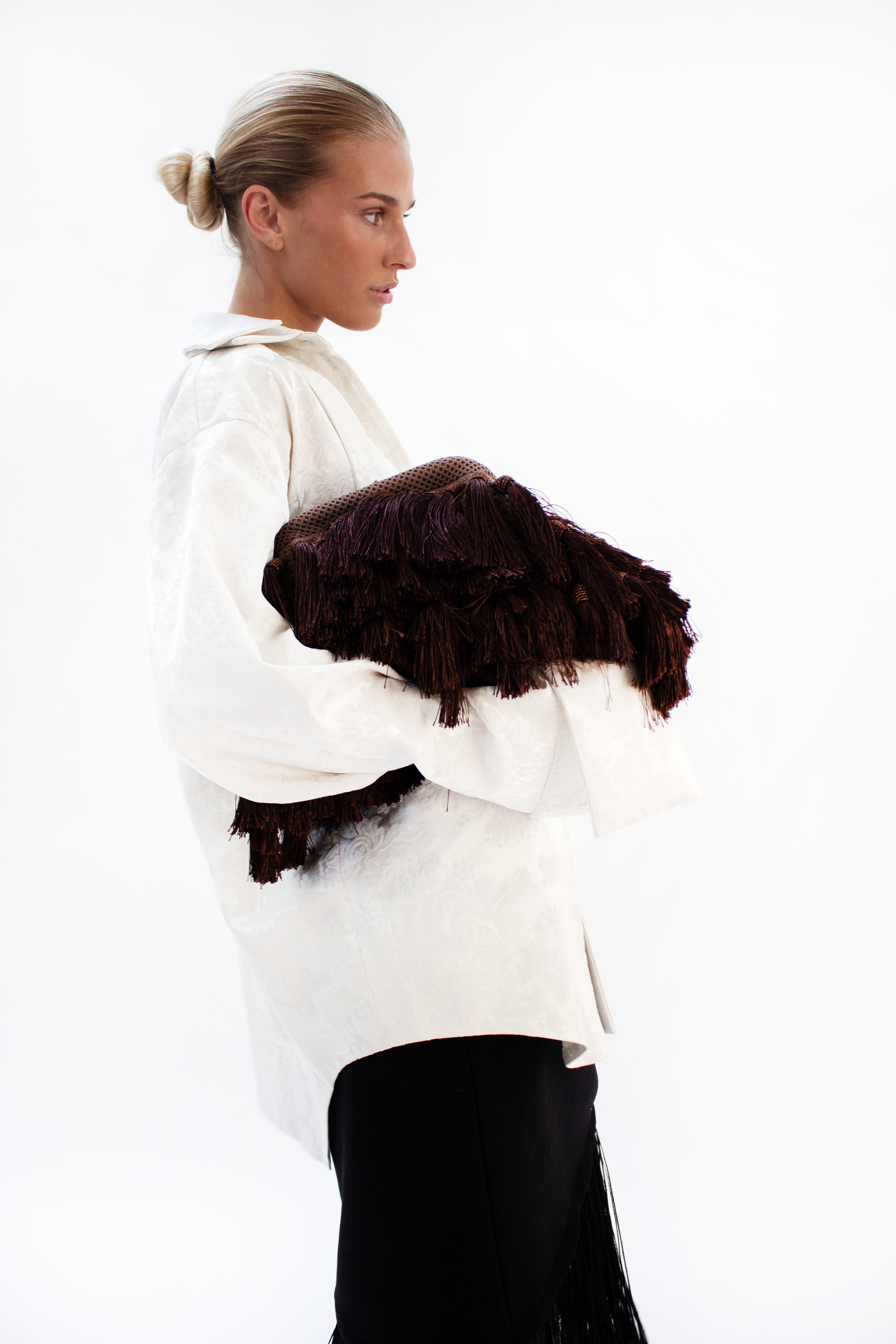 Brown fringe bag